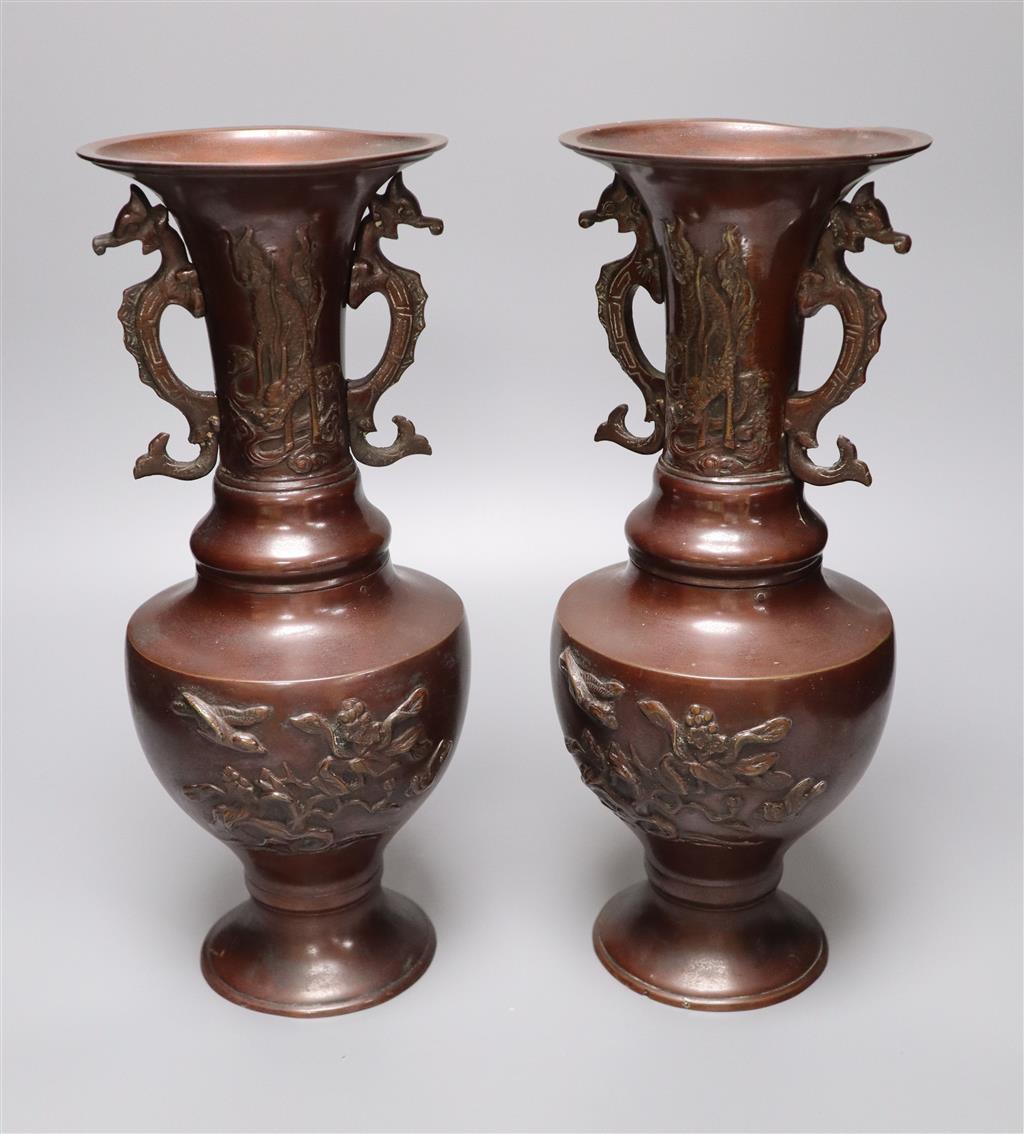A pair of Chinese vases, dragon handles, height 33cm